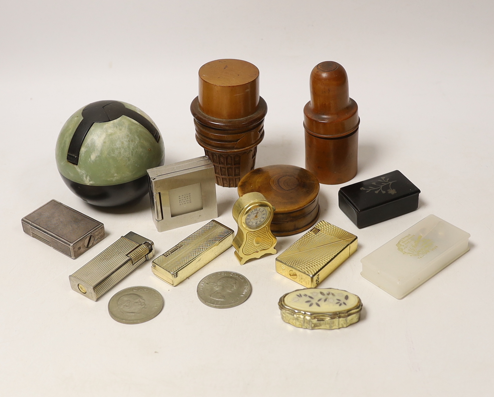 Sundry items including lighters, treen and miniature clocks